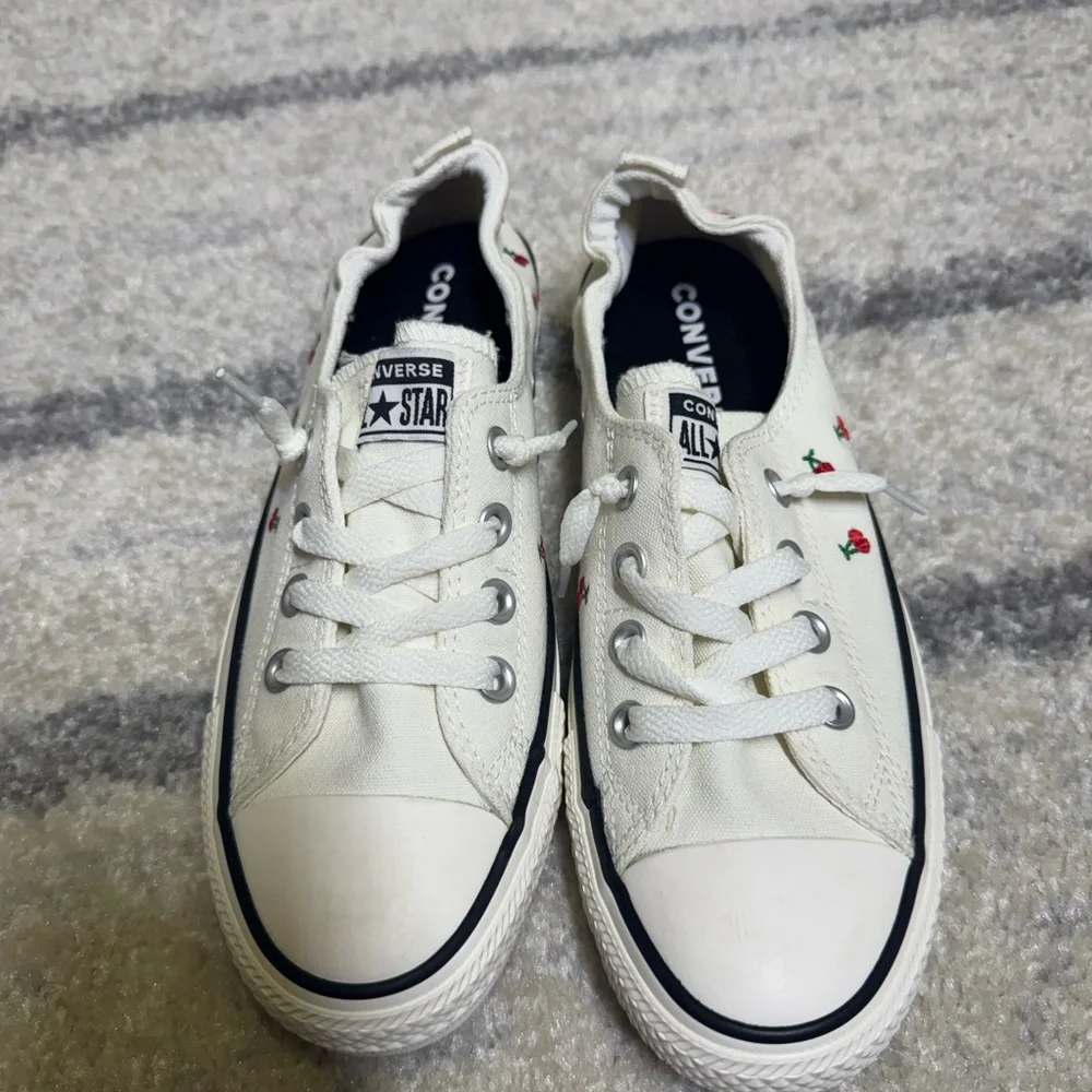Converse White Canvas Low-Tops with Red Accents